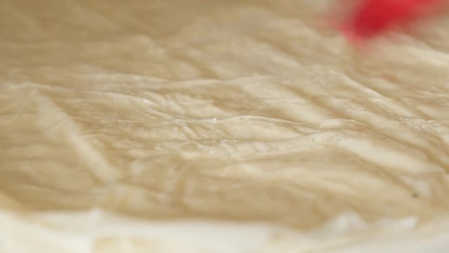 Pie homemade filo with cheese and spinach prepare 4K 2160p 30fps UHD footage - Sunflower oil and beaten eggs mixture spreading over phyllo thin sheets of dough 3840X2160 UltraHD video 