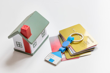 credit cards concept mortgag for new home on white background