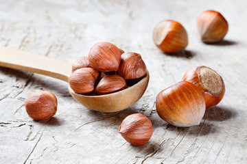 Hazelnut. Fresh organic filbert on wooden background. Nuts macro