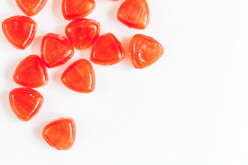sweets and sugar candies on white background top view