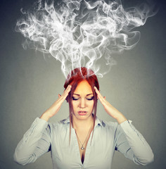 Woman thinks very intensely having headache