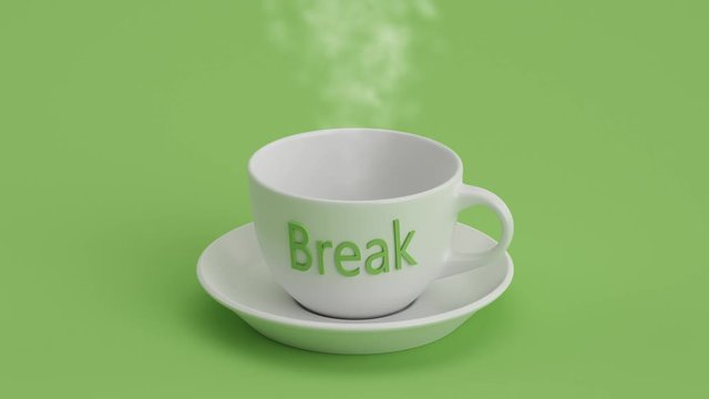 Tasse mit Untertasse mit Aufschrift und Rauch vor gr&uuml;nem Hintergrund