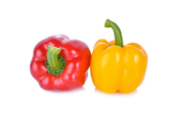 fresh red and yellow sweet pepper with stem on white background