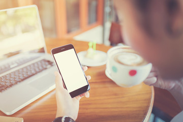 girl using smart phone in cafe.