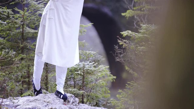 Person make dragon form Nu Dang Gong outside in nature 4K
