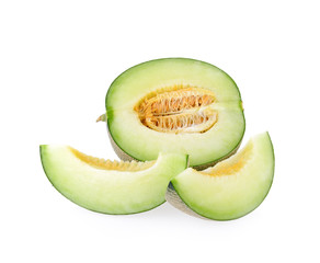 Green cantaloupe melon slices on white background