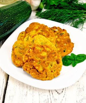 Flapjack chickpeas with zucchini in plate on light board