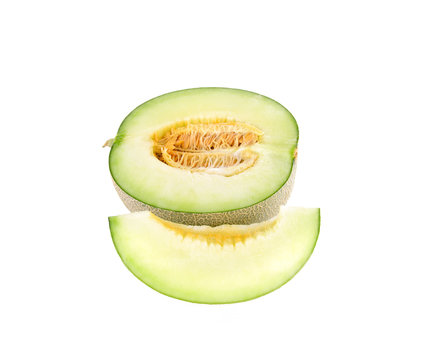 Green cantaloupe melon slices on white background