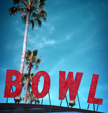 bowling alley sign with palm trees