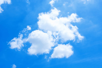 Naklejka na ściany i meble Puffy Clouds background in the sky