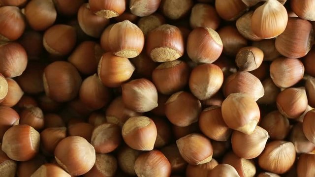 filbert nuts. Placer in a wicker basket, close-up