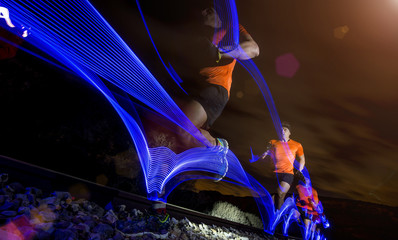 Man running with flashes of light