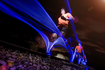Man running with flashes of light