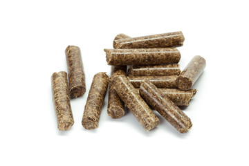 stack of wooden pellets for bio energy, white background, isolated