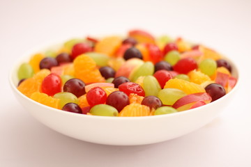  summer fruit bowl on  wooden background,