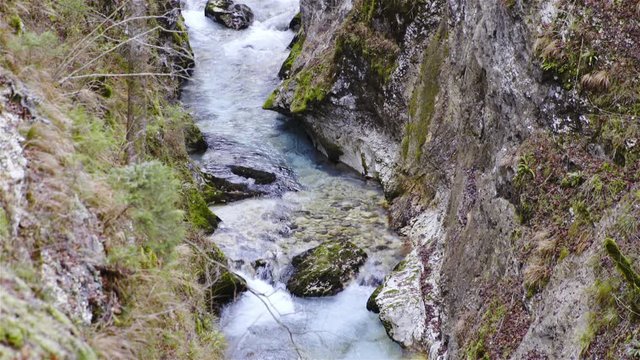 Blue river flowing between Slovenian alps view from above 4K

