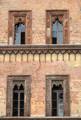 Old window in palace on Piazza Sordello The historic city center of Mantova Lombardy .Italy