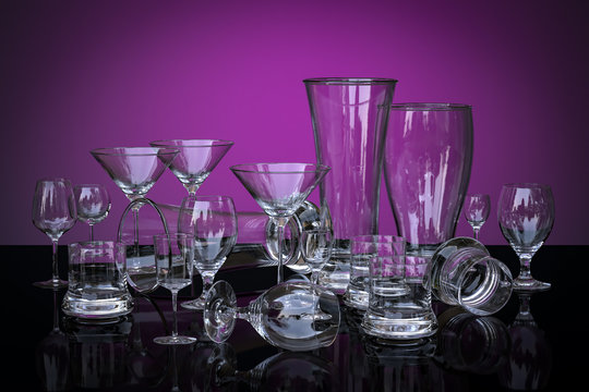 composition of glass goblets on a colored background