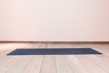 Gym with yoga mat interior