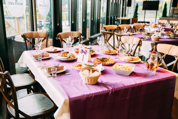 a laid wedding banquet table at a restaurant