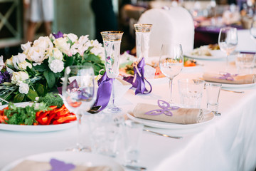 a laid wedding banquet table at a restaurant