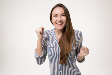 girl celebrating the win or rooting for success isolated