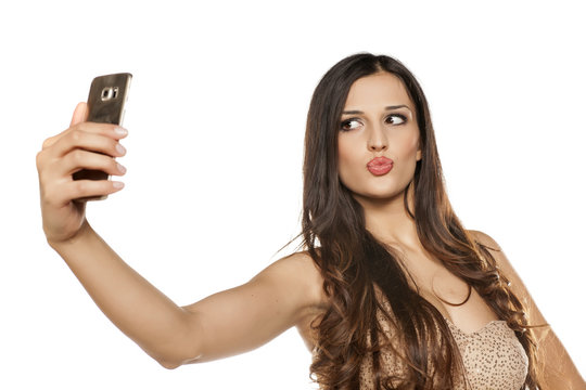young beautiful women take selfies with her smartphone