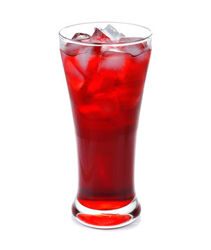 A glass of red soda with ice isolated on white