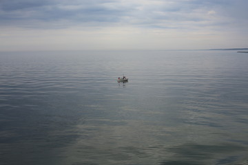 Fototapeta premium Lonely fisherman on the ocean, Denmark