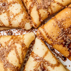 Hot cakes with chocolate close-up