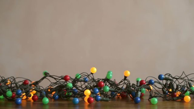Twinkling garland on a wooden table