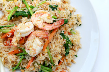 Delicious Shrimp fried rice. Unique style in the white dish on white background,  Thai food.