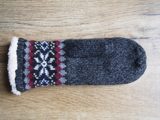 Mitten on wood background