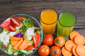 healthy foods are on the table, Fresh vegetable salad in a glass