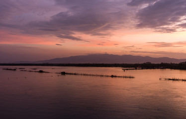 Fototapeta na wymiar sunrise jantaburi sea sky and mountain from thailand