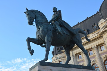 Statue of the king Carol I.Typical urban landscape in the center of Bucharest - Bucuresti,  the...
