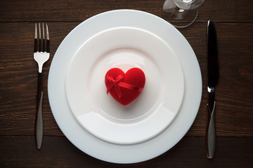 Romantic gift on white plate for Valentines day.