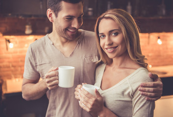 Beautiful couple in kitchen
