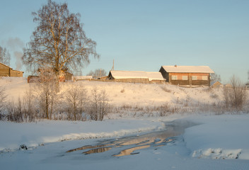 The house on the lake in winter