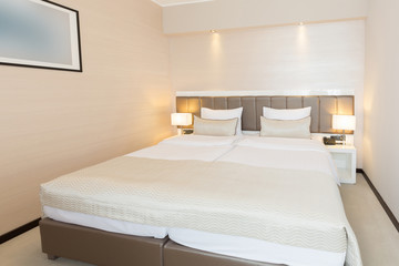 Fototapeta na wymiar Interior of a new hotel bedroom