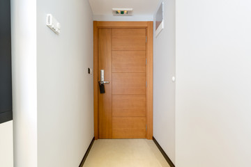 Wooden door in hotel room