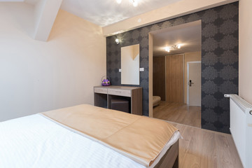 Interior of a new hotel double bed bedroom