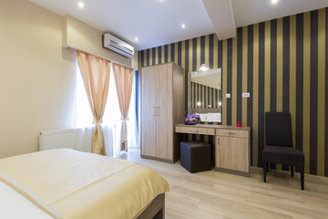 Interior of a new hotel double bed bedroom