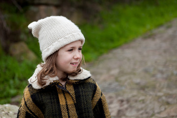 Pretty girl in a park at winter