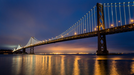 Fototapeta na wymiar San Francisco, CA, USA - July 26, 2014: Bay Bridge between San Francisco and Treasure Island