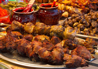 Grilled beef liver kebabs wrapped the fatty in a grid