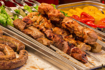 Grilled beef liver kebabs wrapped the fatty in a grid