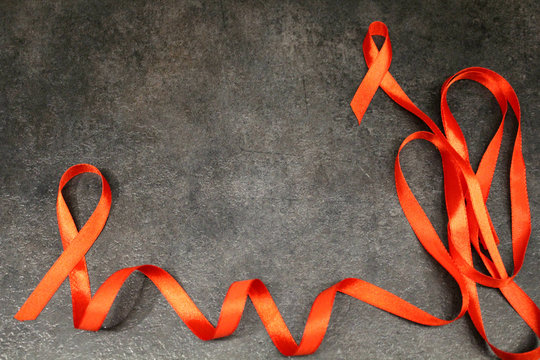 Red ribbon awareness isolated  Symbolic color logo concept raising help campaign on people health public support on HIV STD heart disease