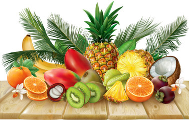 Tropical fruits collection on a wooden surface