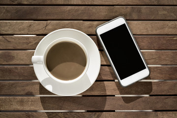 Fototapeta na wymiar white coffee and smartphone